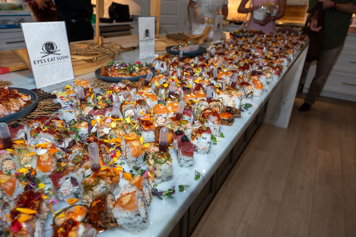 A massive sushi display across a full counter.